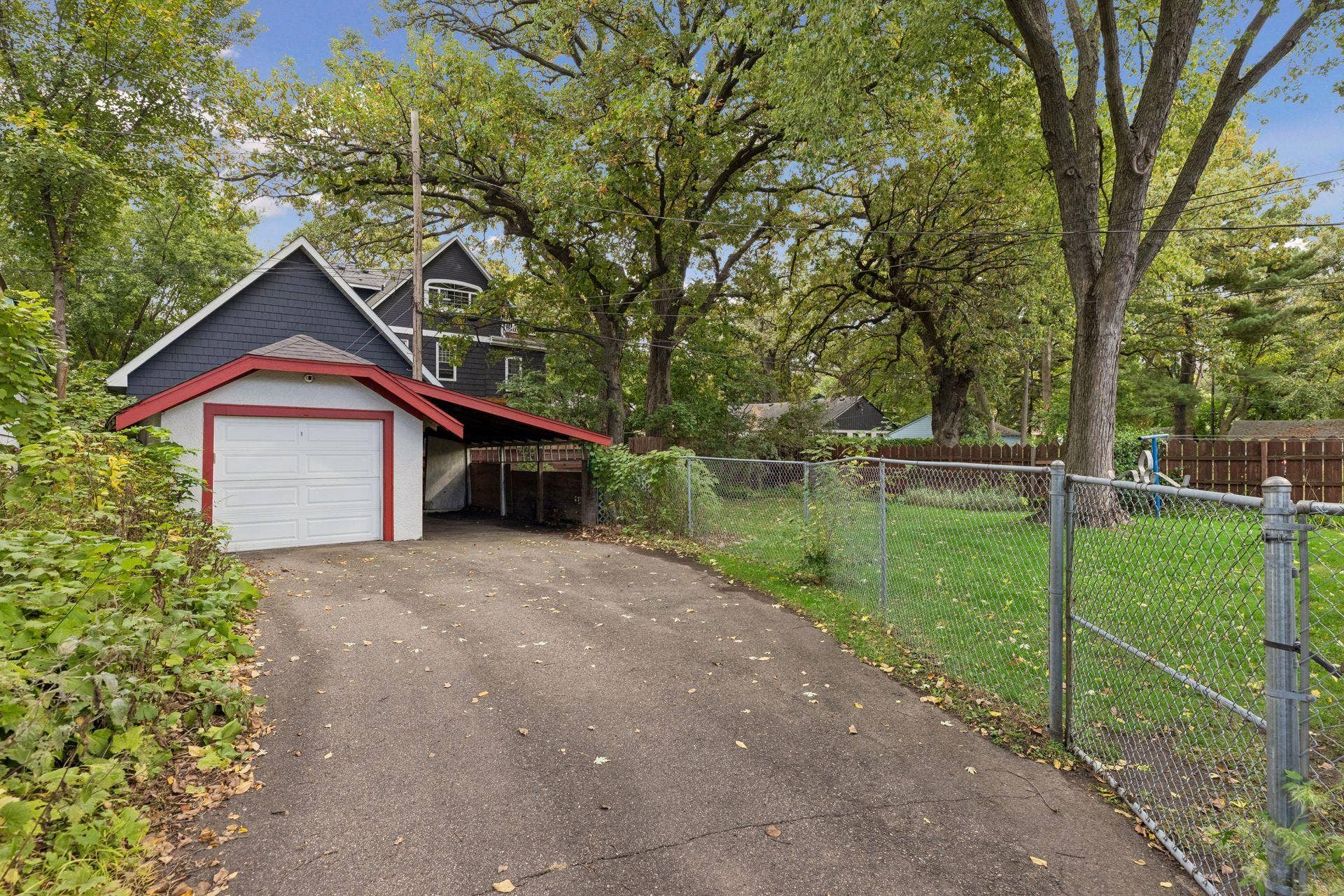 Driveway is a Y shaped and is shared with the neighbor.