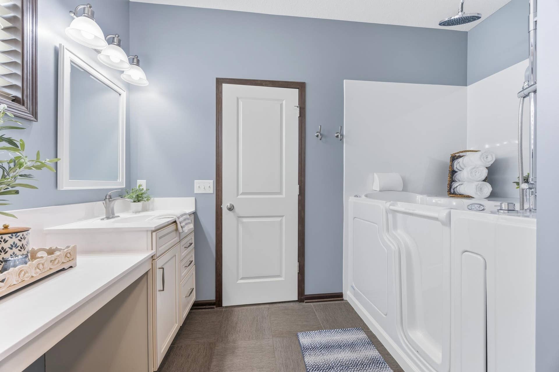 7417 Shadyview Lane N, Maple Grove, MN 55311 Primary bathroom has also been upgraded with accessible walk-in tub with separate shower head and handheld sprayer.