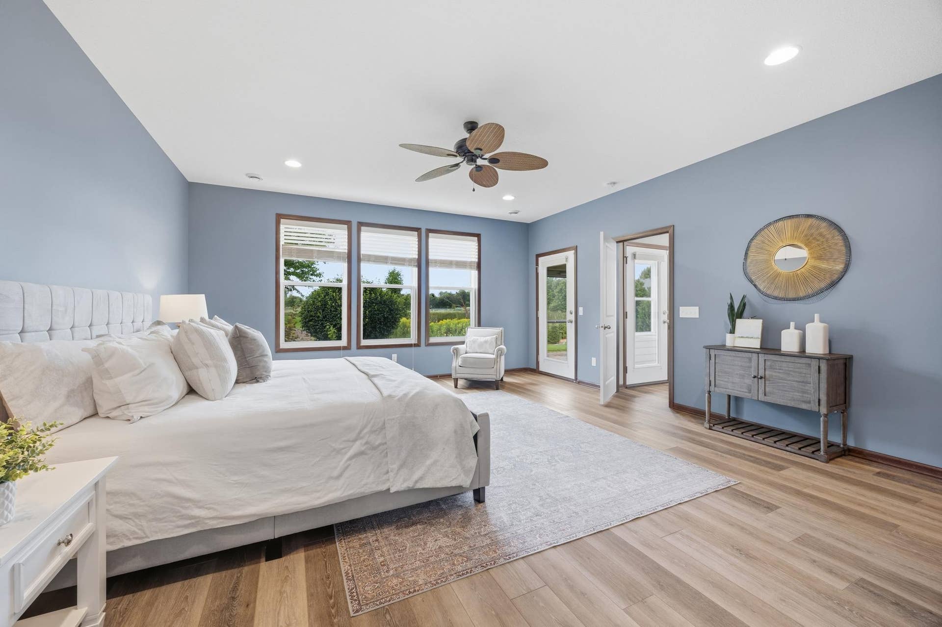 7417 Shadyview Lane N, Maple Grove, MN 55311 Another view of the giant primary bedroom with large windows, great natural light and scenic backyard views.