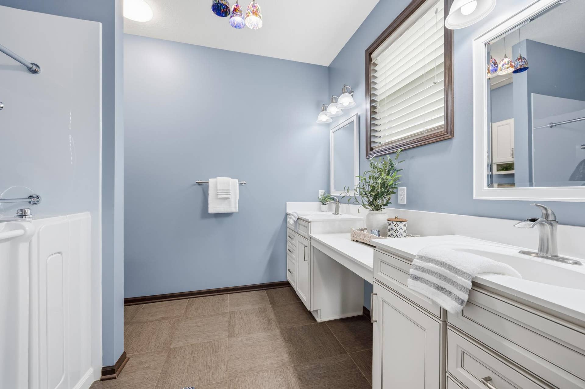 7417 Shadyview Lane N, Maple Grove, MN 55311 Primary bath with dual vanity sink and makeup station.