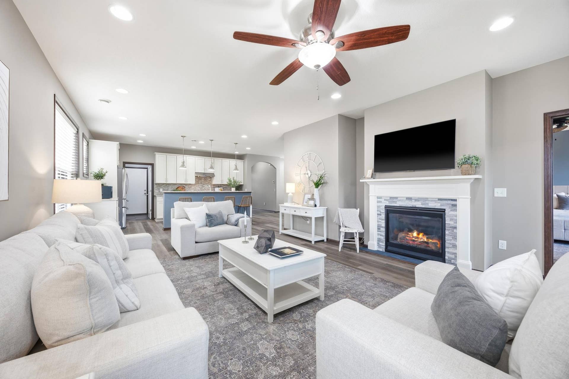 7417 Shadyview Lane N, Maple Grove, MN 55311 Expansive open-concept kitchen/dining and living space.