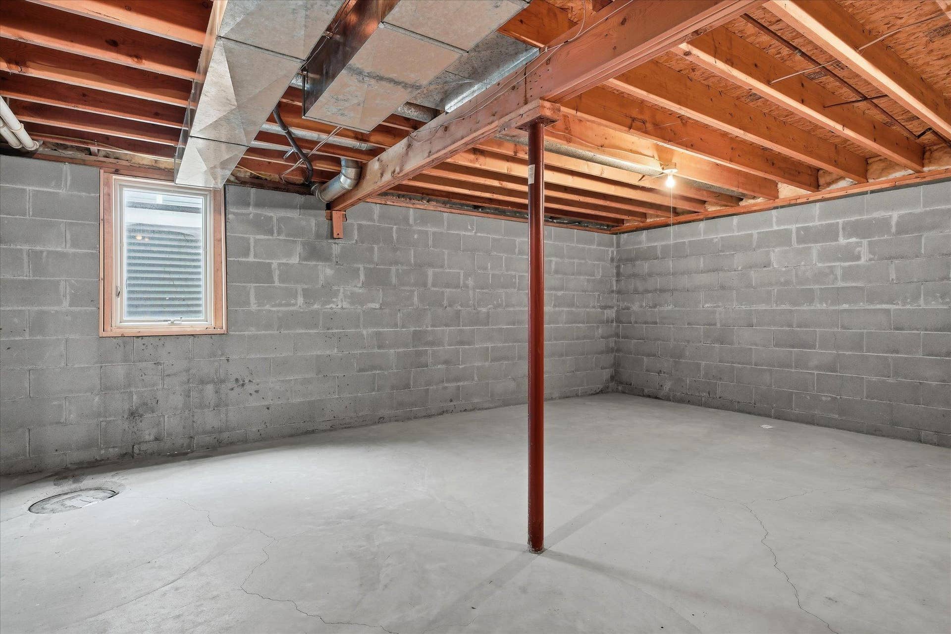 9225 Queens Gardens, Brooklyn Park, MN 55443 Unfinished lower-level space offers excellent future potential, including an egress window that makes this an ideal area to add a fourth bedroom and additional finished equity.