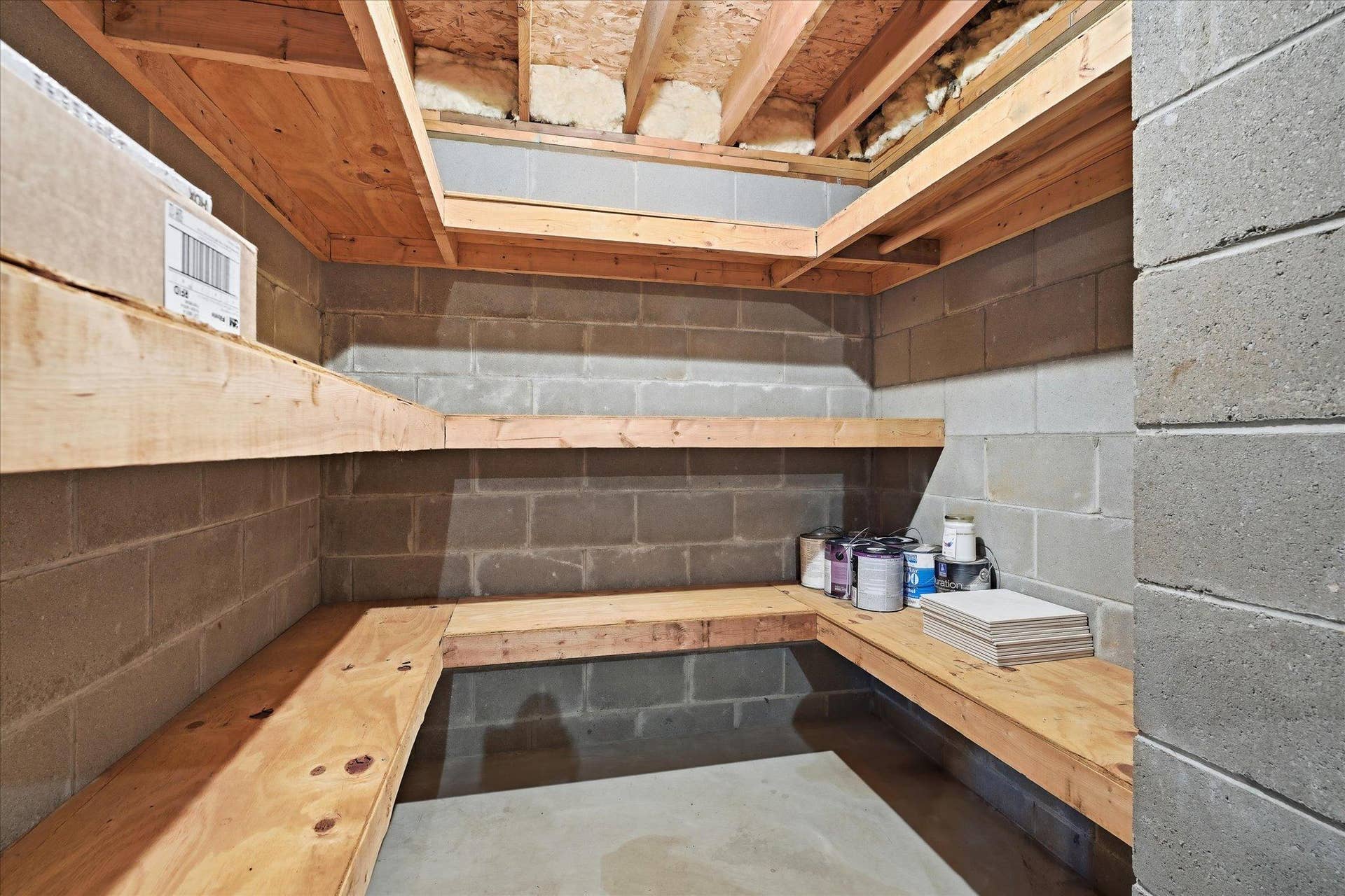 9225 Queens Gardens, Brooklyn Park, MN 55443 Built-in shelving offers lots of room for storage.