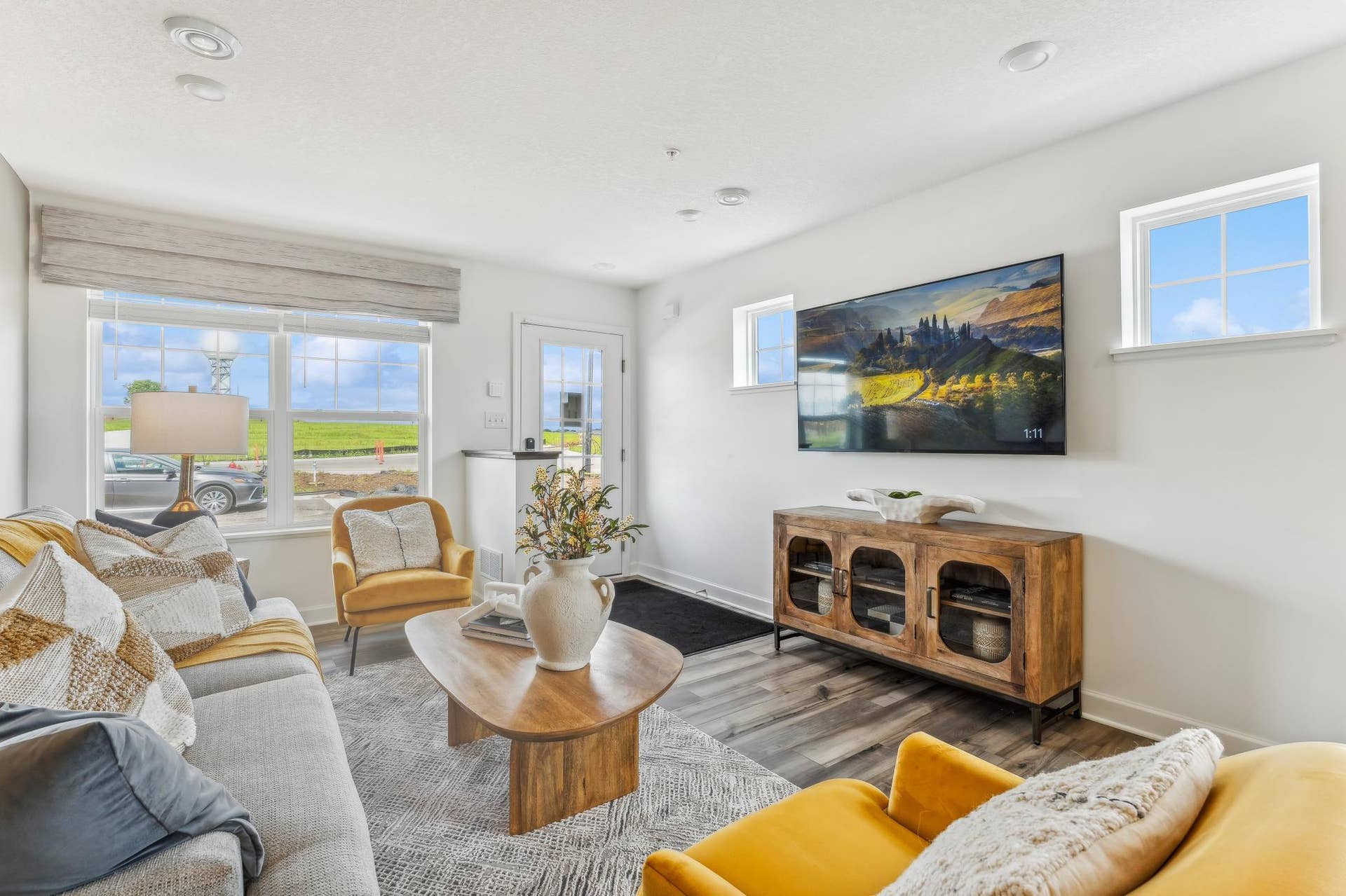 5431 Long Pointe Pass, Woodbury, MN 55129 (Photo of a model home, actual homes finishes will vary) The spacious family gathering area seamlessly connects to the kitchen area, perfect for entertaining.