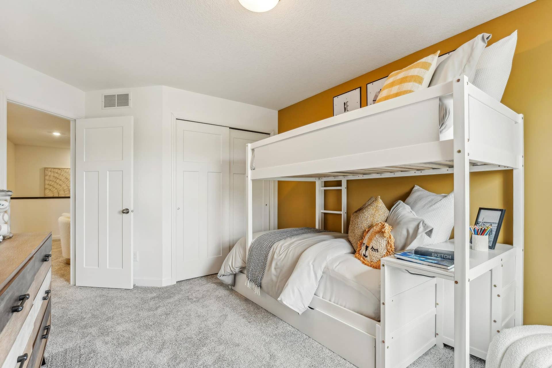 5431 Long Pointe Pass, Woodbury, MN 55129 (Photo of a model home, actual homes finishes will vary) One of two generously sized upper level secondary bedrooms with spacious closets.
