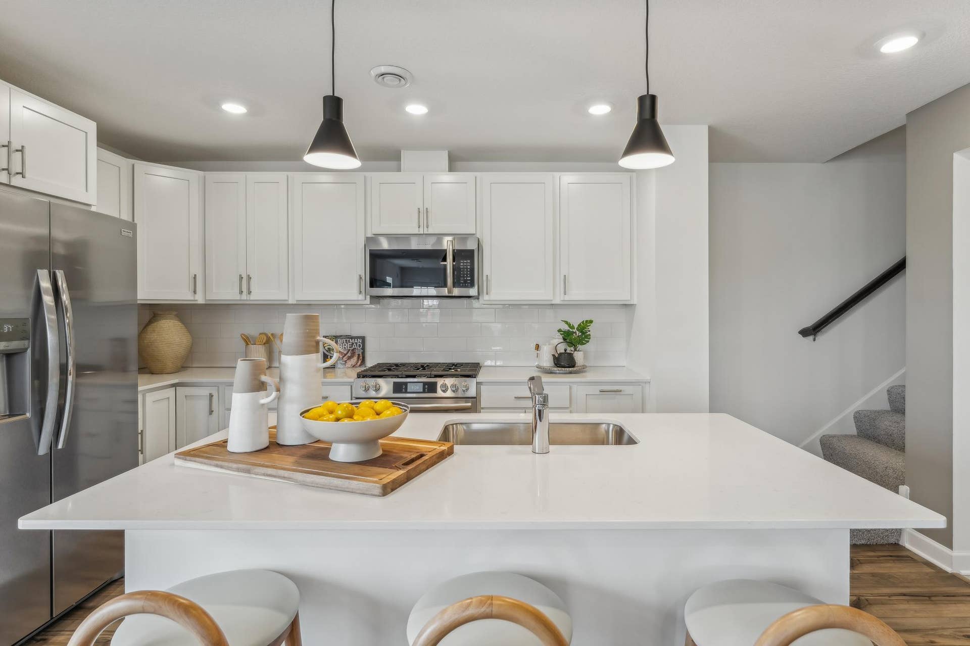 5431 Long Pointe Pass, Woodbury, MN 55129 (Photo of a model home, actual homes finishes will vary) This kitchen is very open and connect seamlessly to the dinning area!