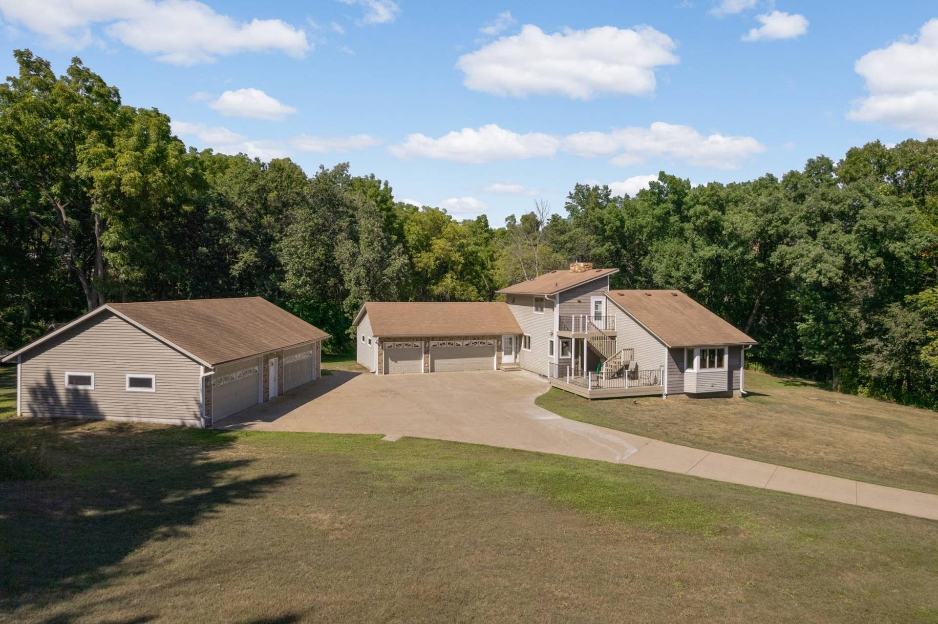 12770 Homestead Drive, Hugo, MN 55110 Features a 7 car garage and separate apartment