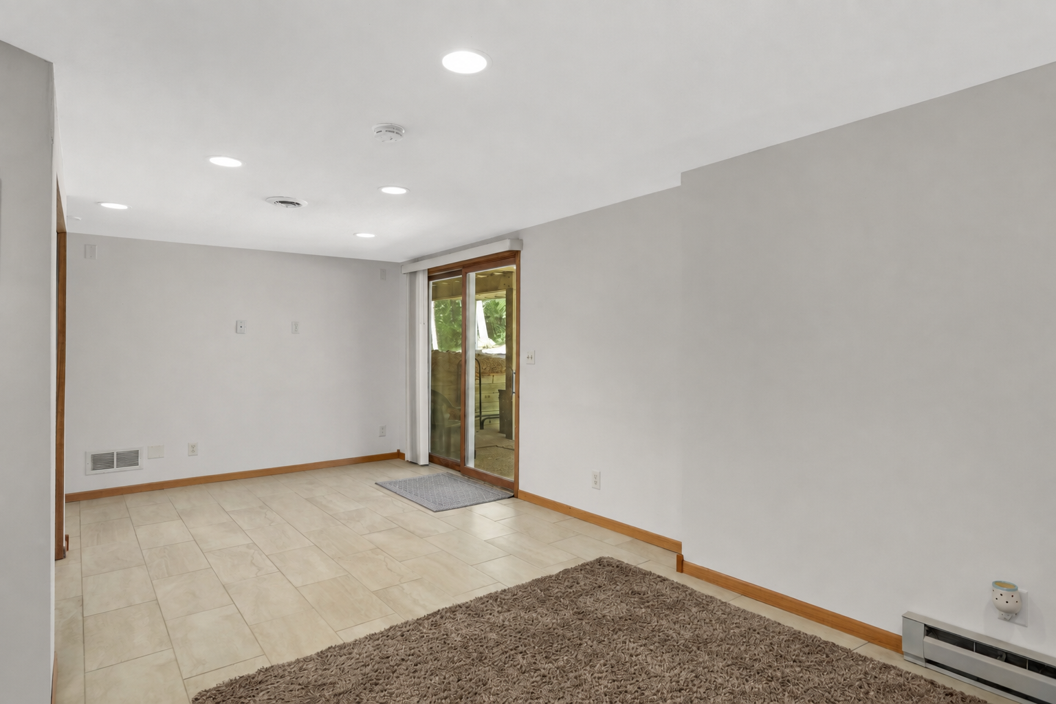 12770 Homestead Drive, Hugo, MN 55110 Walkout lower level family room