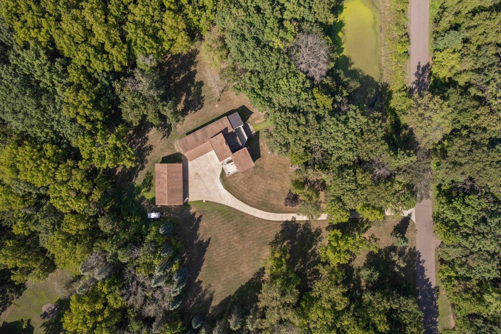 12770 Homestead Drive, Hugo, MN 55110 Private wooded lot with pond