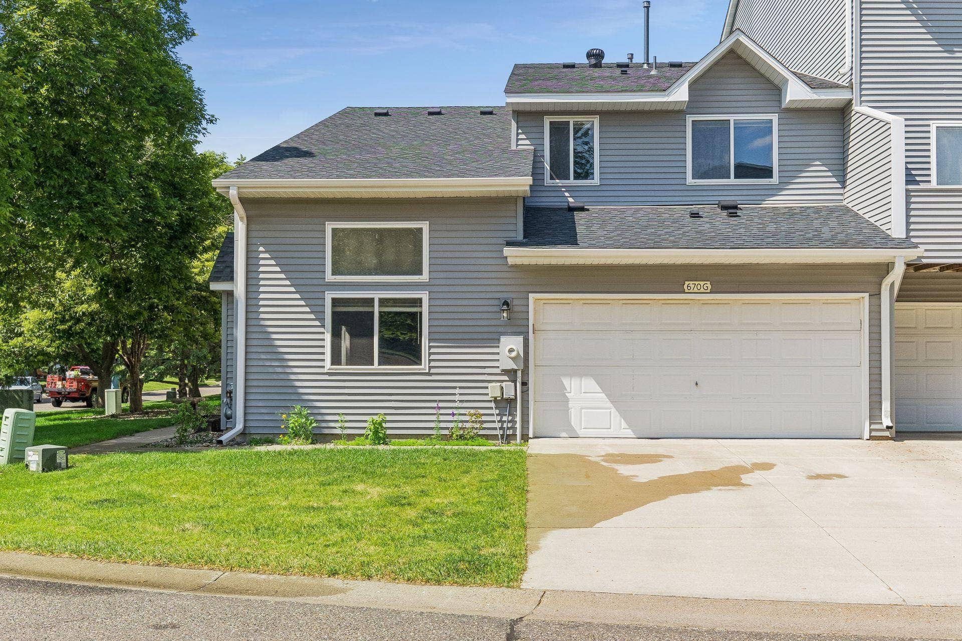 670 Kingfisher Lane, #G, Woodbury, MN 55125 Welcome home to 670 Kingfisher Lane! A charming 2 story, end unit, townhome located in the heart of Woodbury!