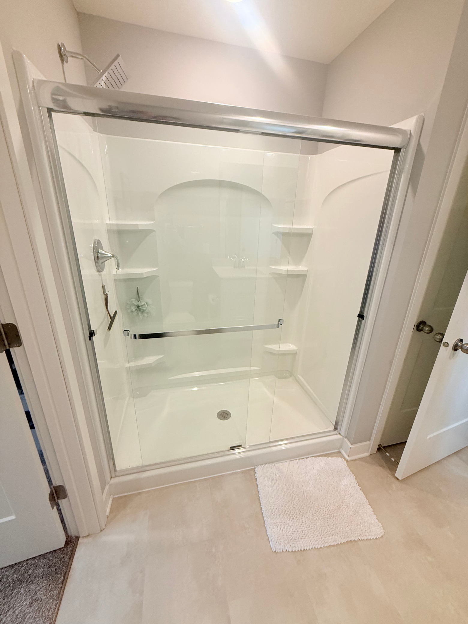 7238 Dora Drive, Hugo, MN 55038 Large walk-in shower with glass door.