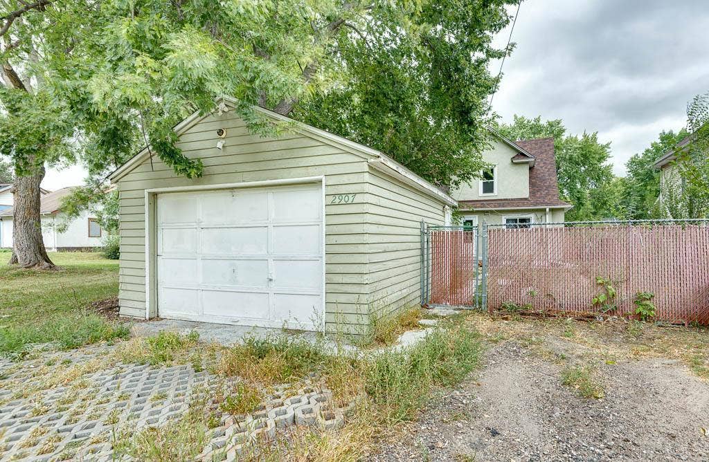 2907 Penn Avenue N, 36, Minneapolis, MN 55411 One car garage with extra unpaved parking spots.