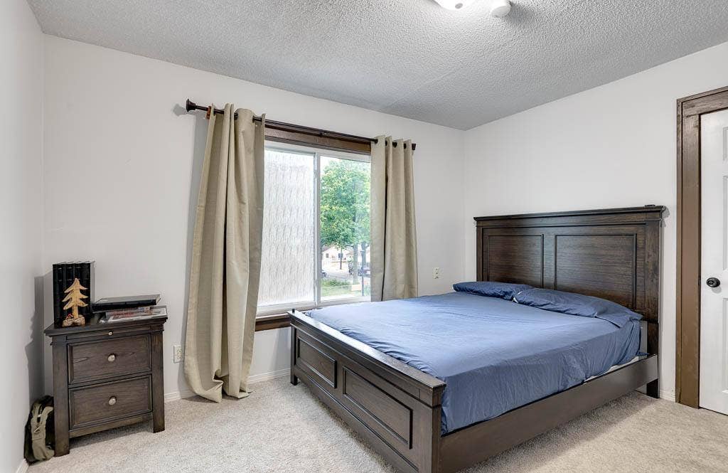 2907 Penn Avenue N, 36, Minneapolis, MN 55411 The spacious primary bedroom is on the second floor and has a walk-in closet.