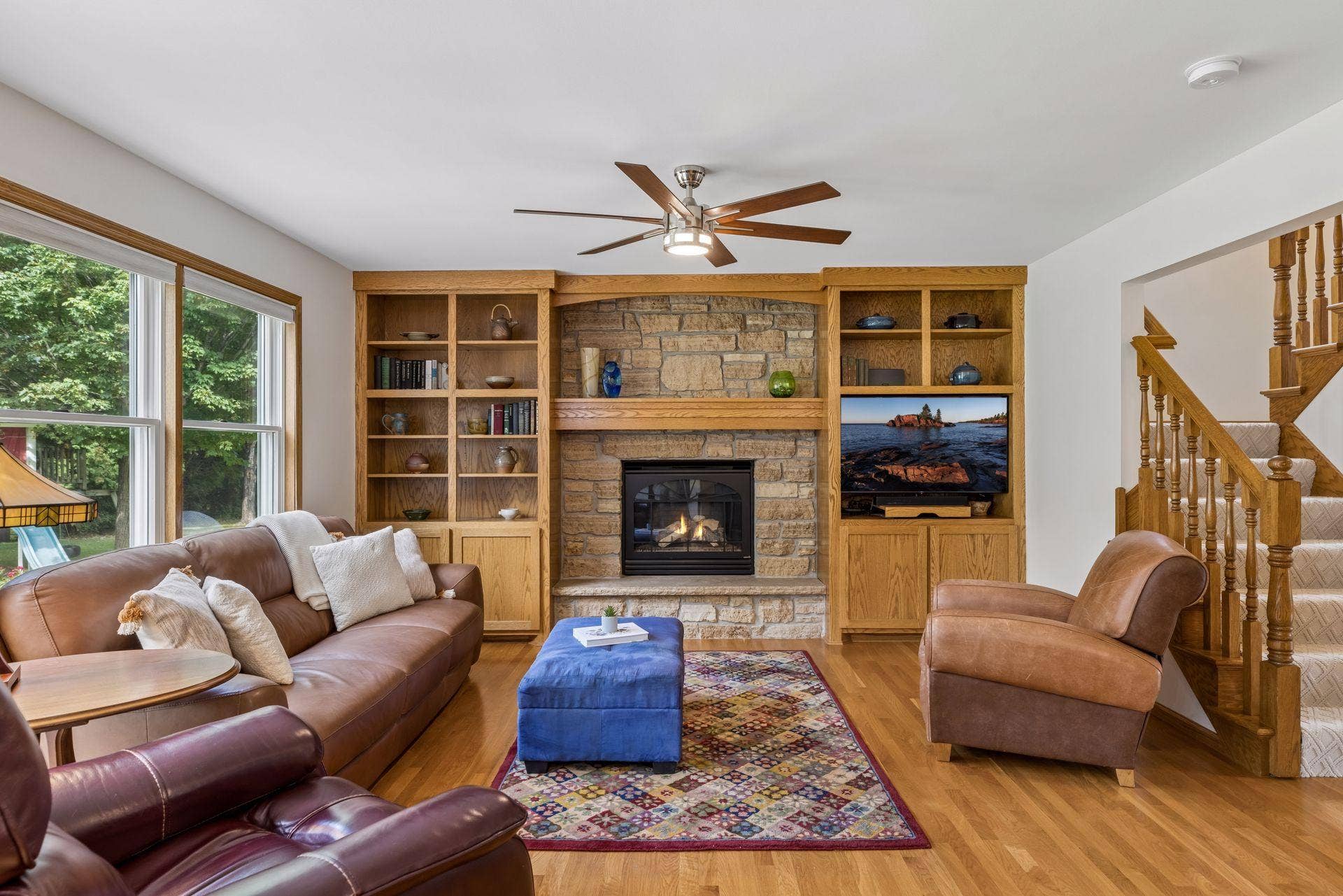 1008 Eagle Ridge Court, Stillwater, MN 55082 A closer look at the fireplace and custom built-inssuch a cozy and beautiful focal point for this inviting space.