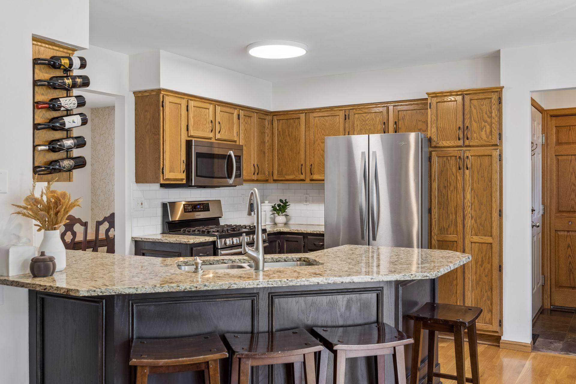 1008 Eagle Ridge Court, Stillwater, MN 55082 Beautifully updated backsplash and newer appliances add a fresh, polished touch to the kitchen.