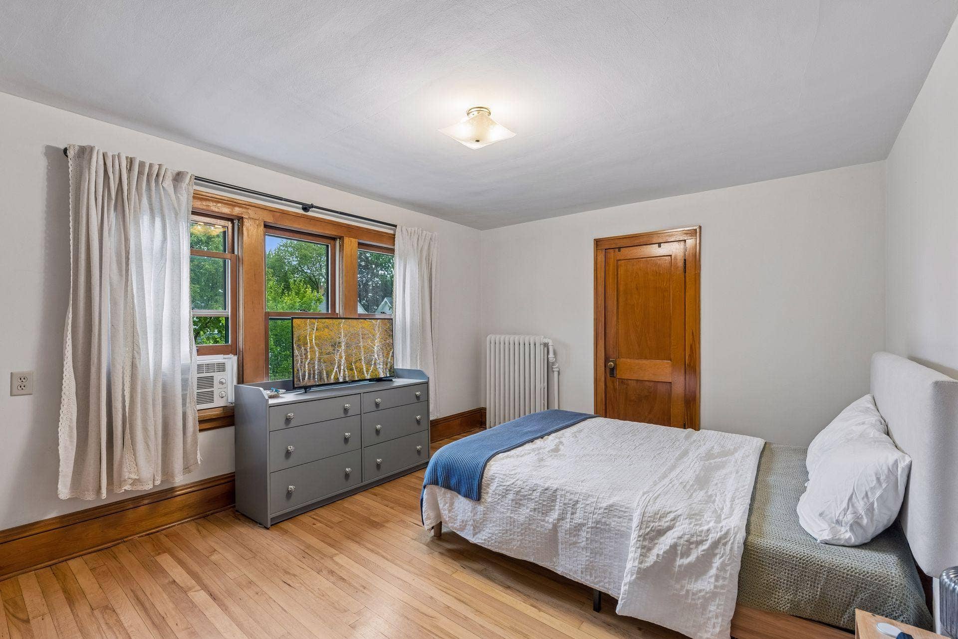 Primary bedroom (w/ dual closets)