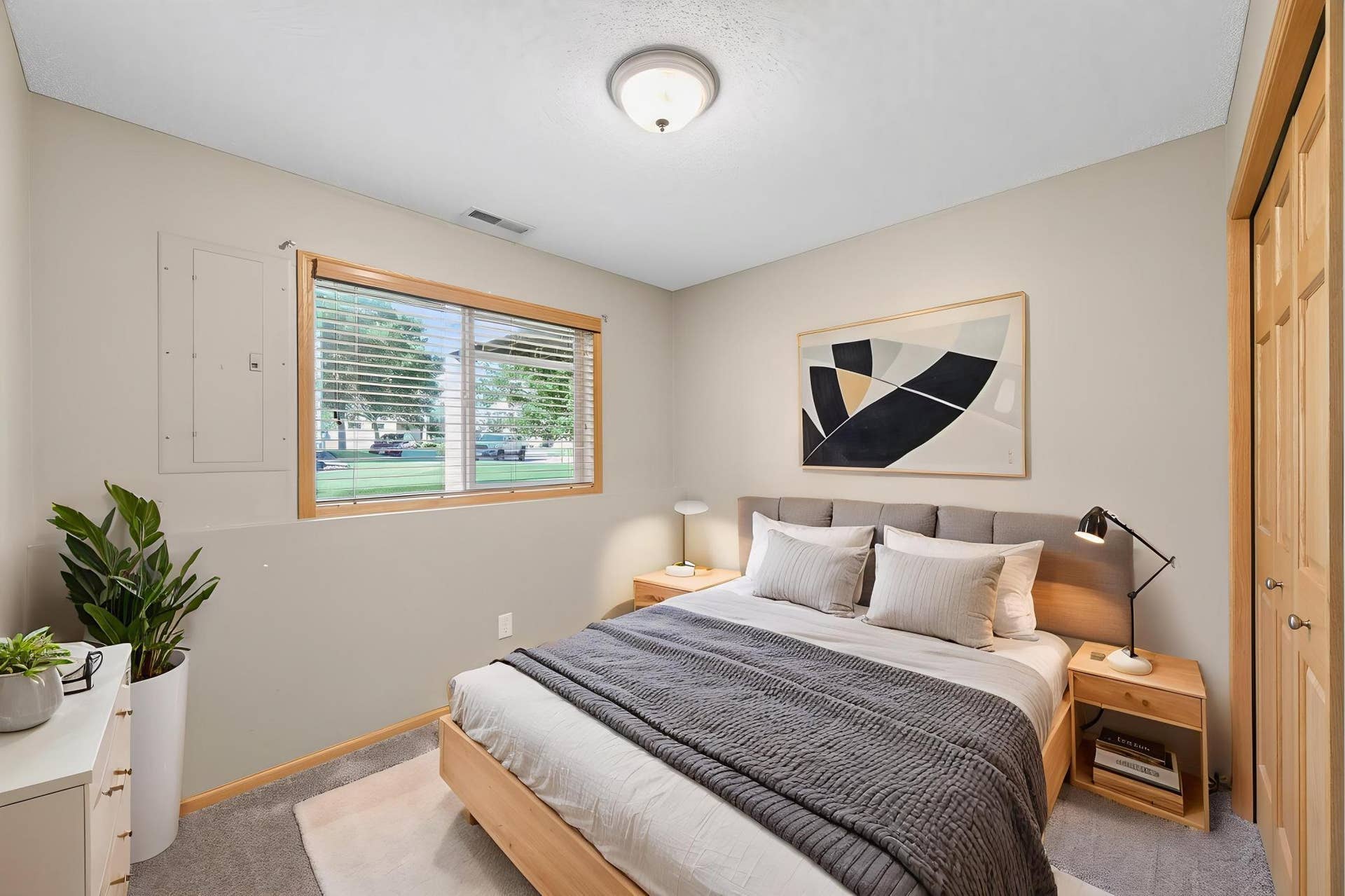 11631 Prospect Curve, Woodbury, MN 55129 Lower level 3rd bedroom with custom window treatments.