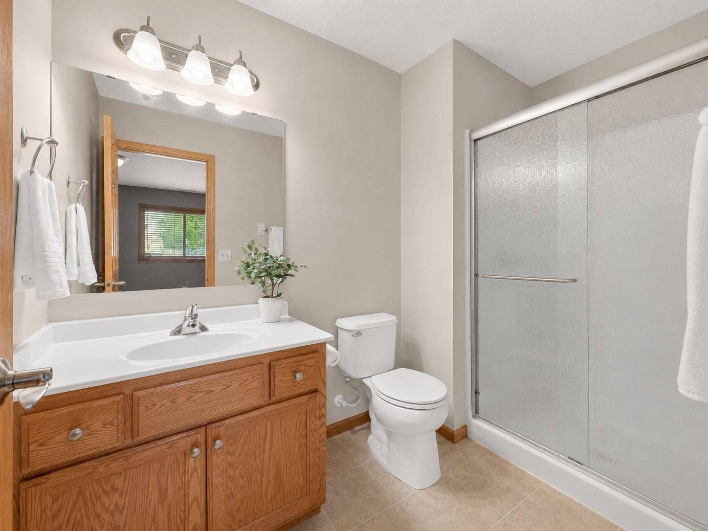 11631 Prospect Curve, Woodbury, MN 55129 Lower level 3/4 bathroom servicing the entire basement area.