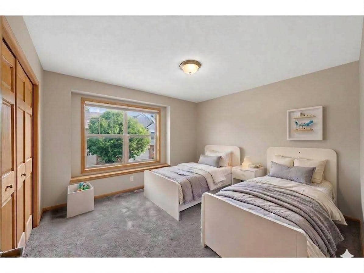 11631 Prospect Curve, Woodbury, MN 55129 The versatile second bedroom offers flexibility to fit your lifestyle. Spacious so perfect for a 2nd bedroom, or as a guest room, home office, hobby space, or additional flex room.