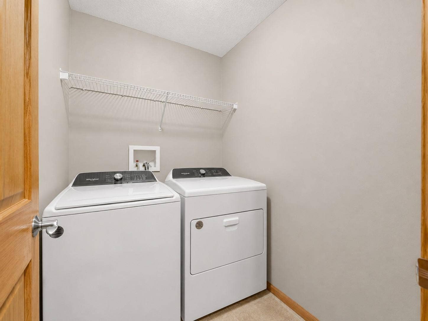 11631 Prospect Curve, Woodbury, MN 55129 No more carrying laundry up and down stairs; enjoy the convenience of an upper-level laundry room perfectly placed near the bedrooms.