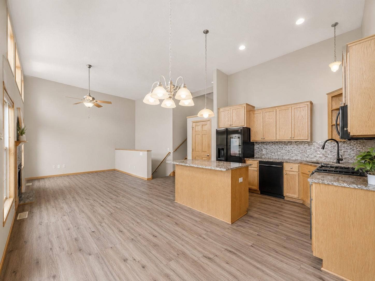 11631 Prospect Curve, Woodbury, MN 55129 Whether hosting guests or spending a quiet evening at home, you'll love the seamless flow between the kitchen, dining room, and spacious living room.