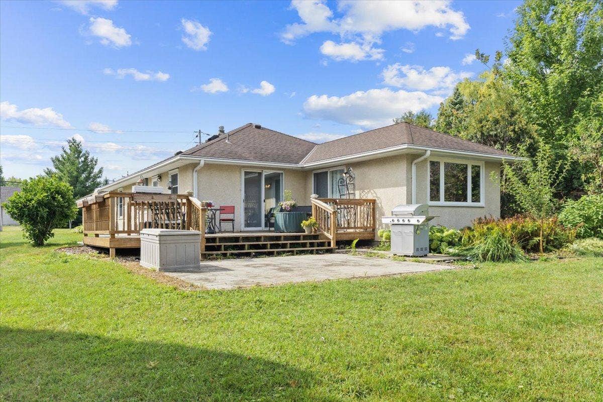4090 Highland Avenue, White Bear Lake, MN 55110 Great oversized 25x13 deck with 2 patio doors, one off of the dining room and on from the kitchen. Also large paver patio area for additional seating or great space for your grill!