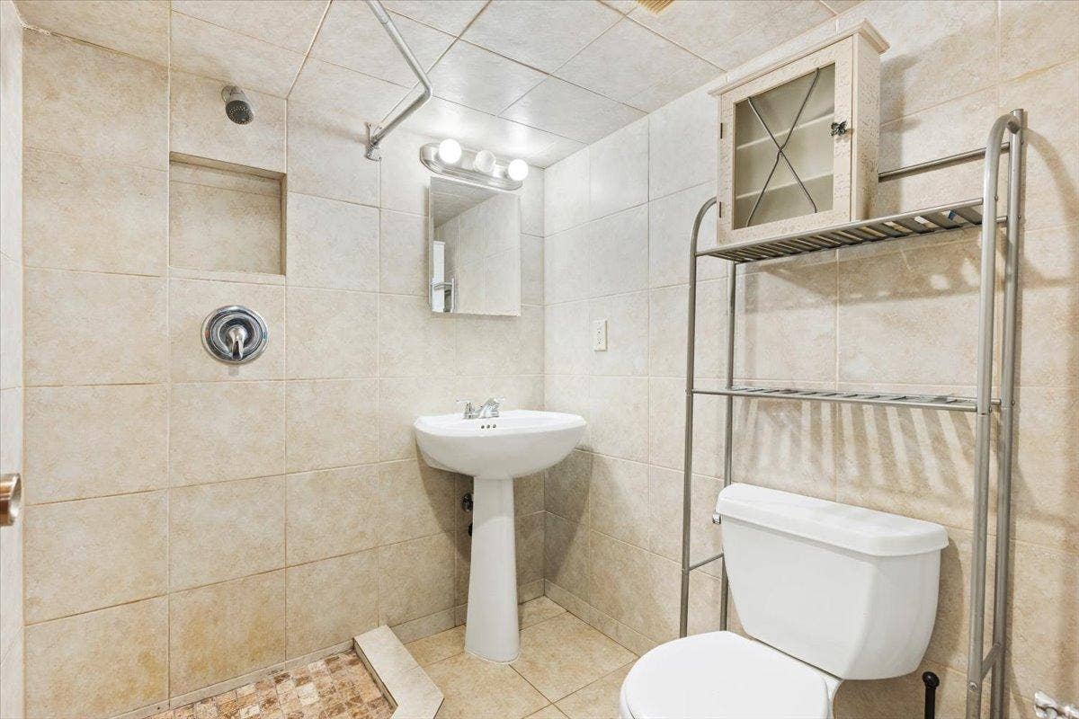 4090 Highland Avenue, White Bear Lake, MN 55110 Lower level fully tiled 3/4 bath.
