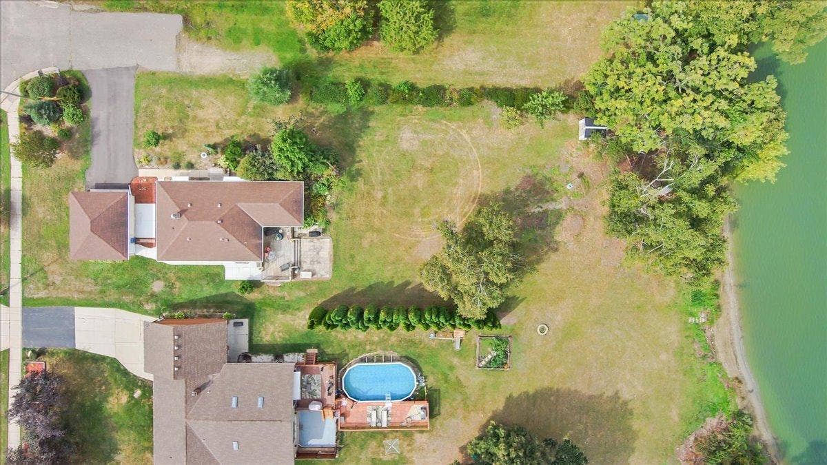 4090 Highland Avenue, White Bear Lake, MN 55110 Aerial view of your property. 78 feet of lakeshore and private drive with bonus space for additional parking!