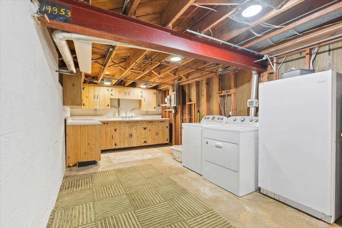 4090 Highland Avenue, White Bear Lake, MN 55110 Lower level kitchenette and laundry. Freezer does not stay
