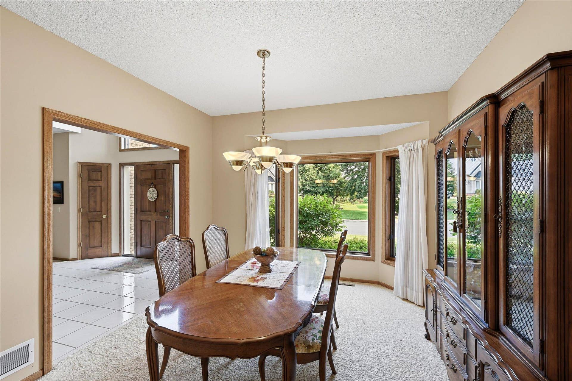 11412 Louisiana Avenue S, Bloomington, MN 55438 A dedicated formal dining area provides additional space for hosting meals and gatherings.