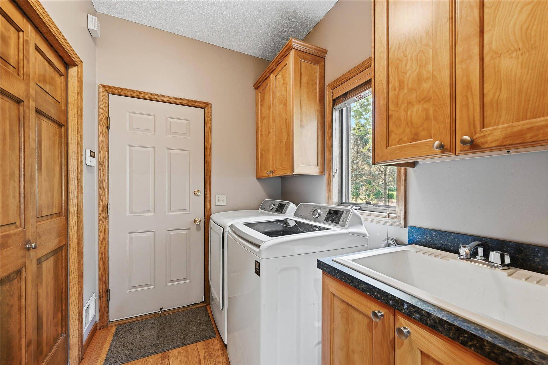 11412 Louisiana Avenue S, Bloomington, MN 55438 A dedicated laundry room on the main level keeps everyday tasks conveniently located.