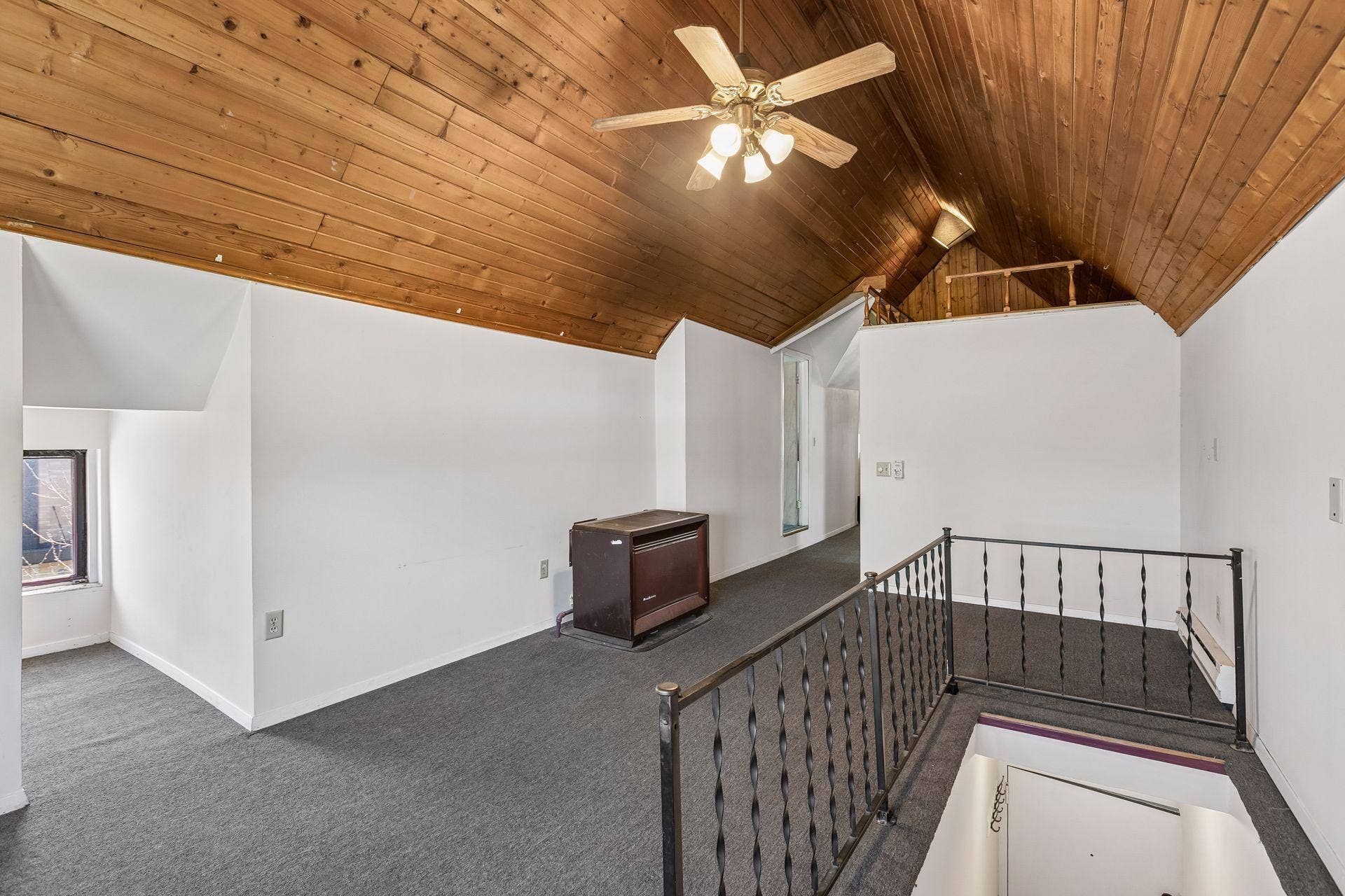 1300 Grand Street NE, 68, Minneapolis, MN 55413 Unit 3 (third floor) features a kitchen, living area, and one bedroom with an adjacent bathroom.