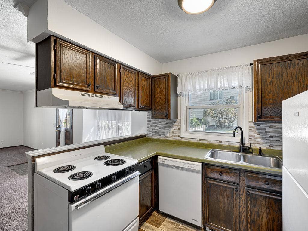 4954 Grenwich Trail N, Oakdale, MN 55128 Here is another view of the kitchen.