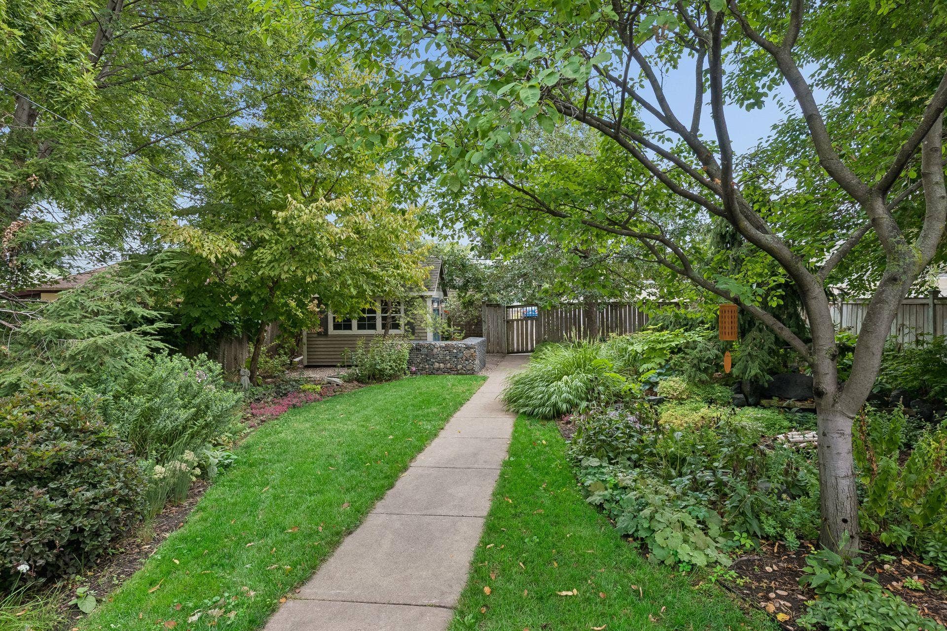 3223 Blaisdell Avenue, 48, Minneapolis, MN 55408 The fully fenced backyard is a beautiful private retreat.