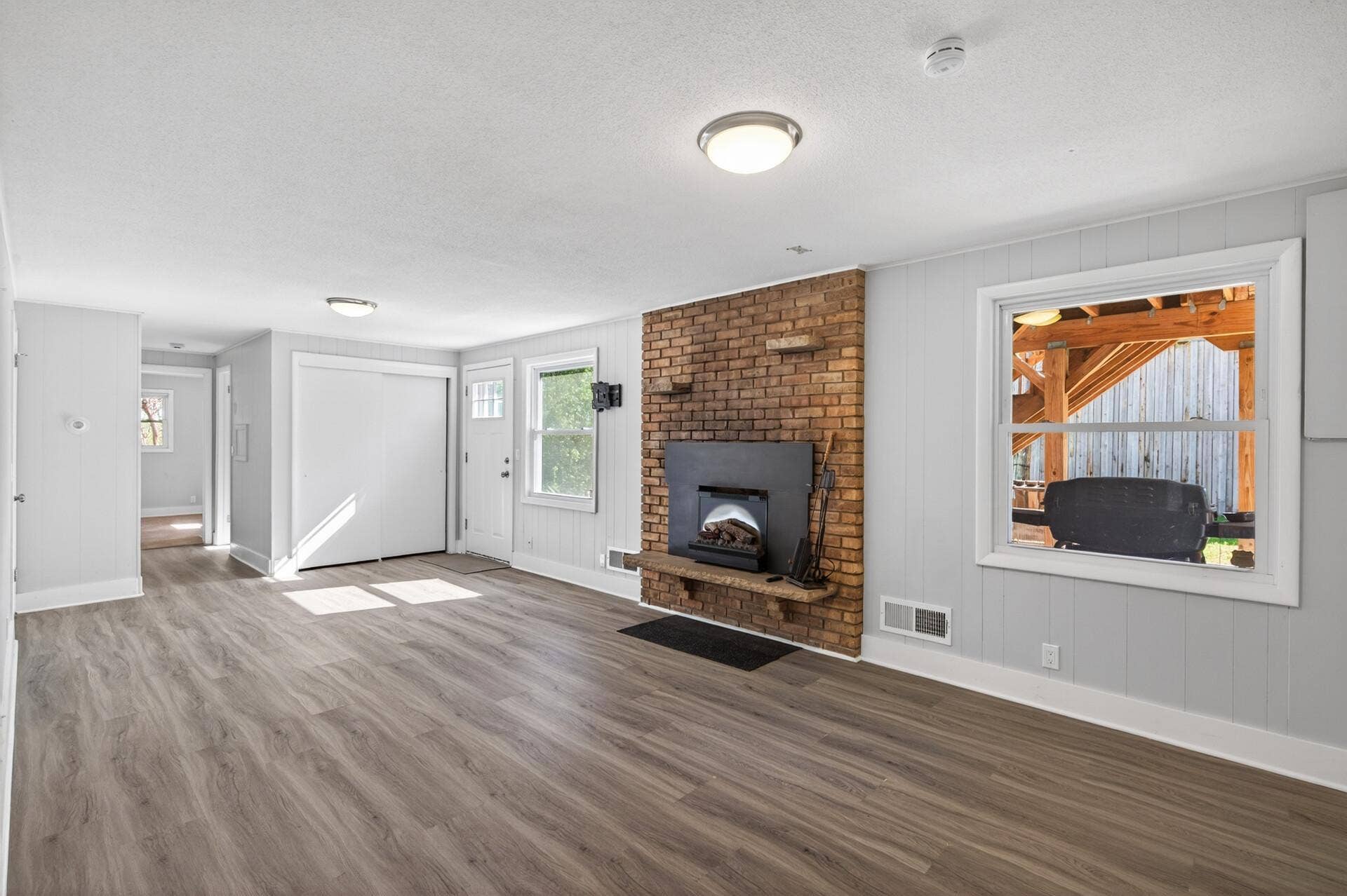 2580 Winfield Avenue, Golden Valley, MN 55422 Lower level family room with electric fireplace and walkout to backyard