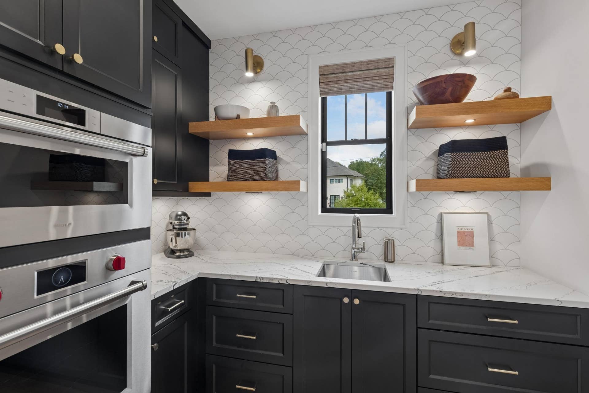 363 Woodlawn Avenue, 95, Saint Paul, MN 55105 Well-appointed prep kitchen with Wolf double wall ovens & open shelvings.