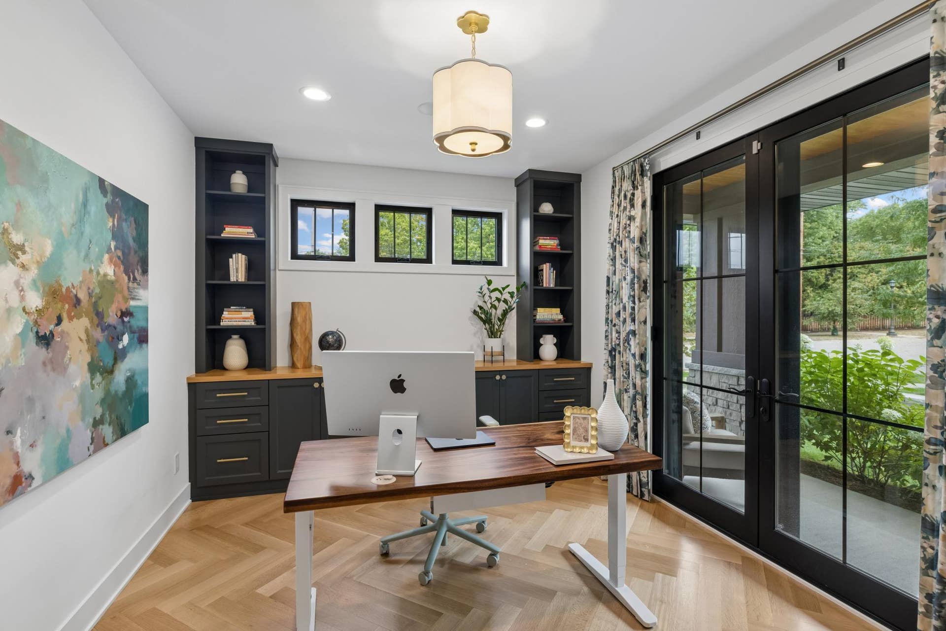 363 Woodlawn Avenue, 95, Saint Paul, MN 55105 Light-filled front office with custom built-ins & French doors to the porch.
