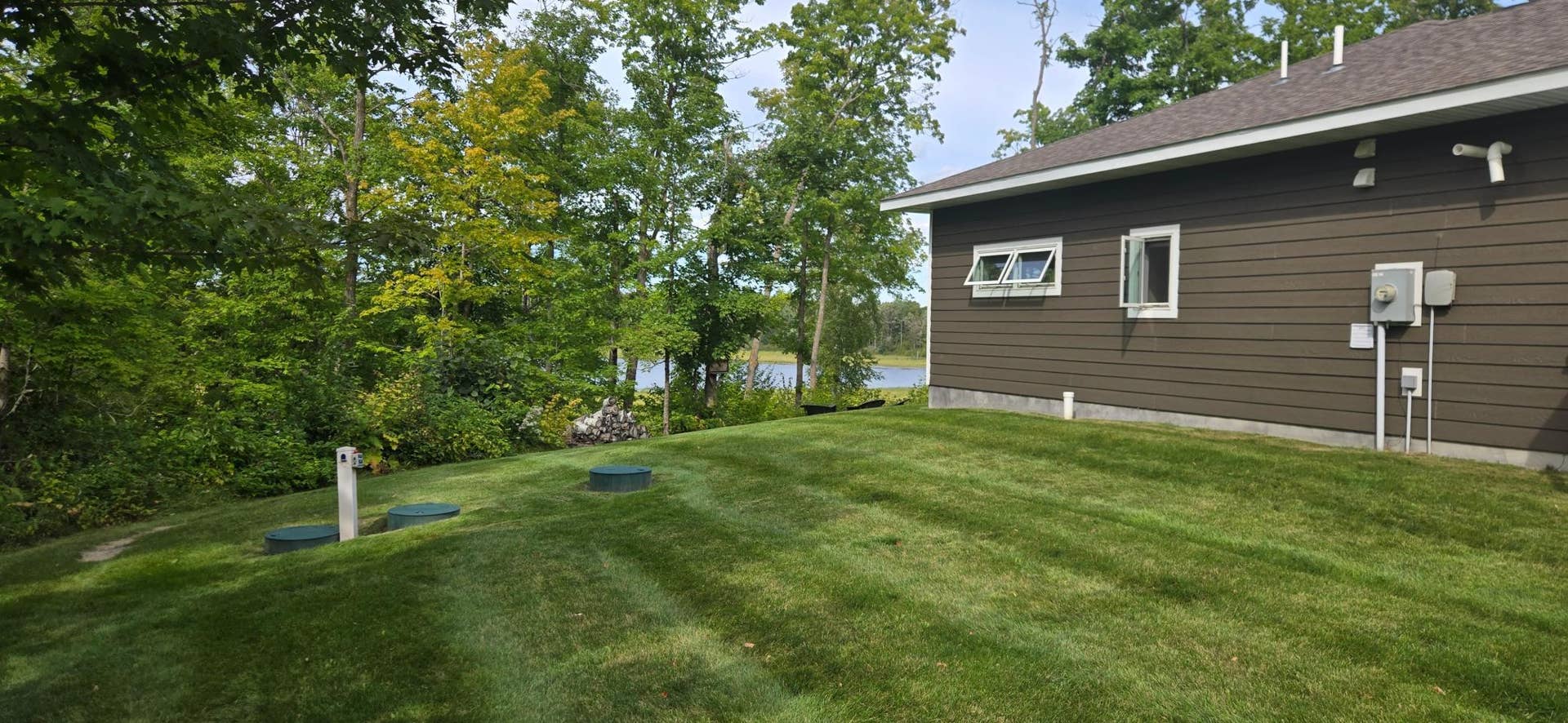 14647 Anjonabe Court SE, Bemidji, MN 56601 House Side & Backyard.jpg