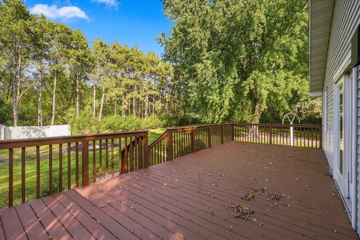 272 Glenmont Road, River Falls, WI 54022 Large deck with plenty of space for outdoor dining/grilling, entertaining and relaxing.