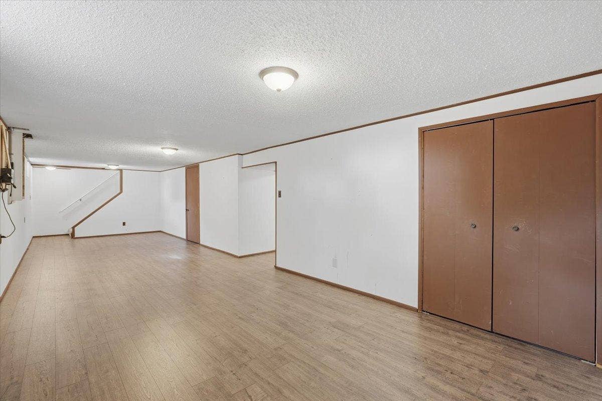 272 Glenmont Road, River Falls, WI 54022 Versatile lower level family room with plenty of room to make it your own.