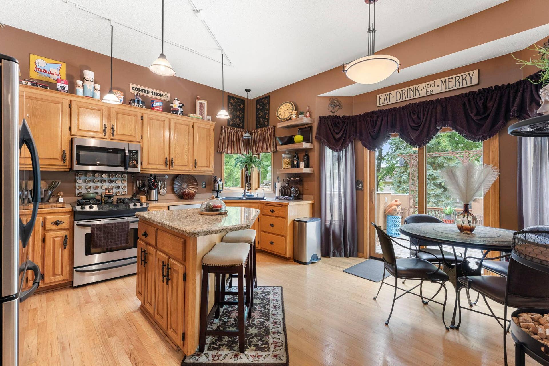 17269 80th Place N, Maple Grove, MN 55311 Kitchen with beautiful wood cabinets and kitchen island.