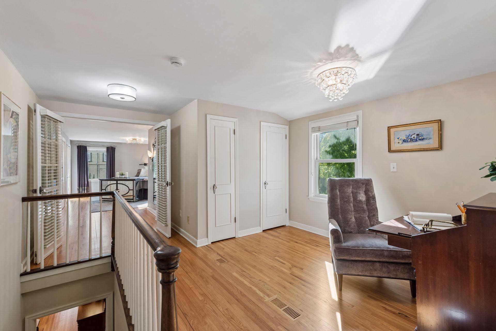 5212 Humboldt Avenue S, 49, Minneapolis, MN 55419 Upper-Level Landing - Hardwood floors continue through this spacious upper landing, offering room for a desk or sitting area with easy access to the surrounding bedrooms.