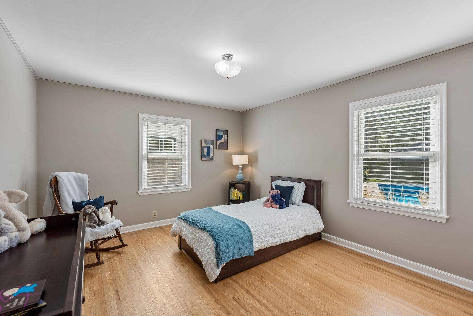5212 Humboldt Avenue S, 49, Minneapolis, MN 55419 Main Floor Bedroom - Bright bedroom with hardwood floors and windows on two walls. Generous dimensions provide room for bedroom furniture, a reading chair, or additional storage.