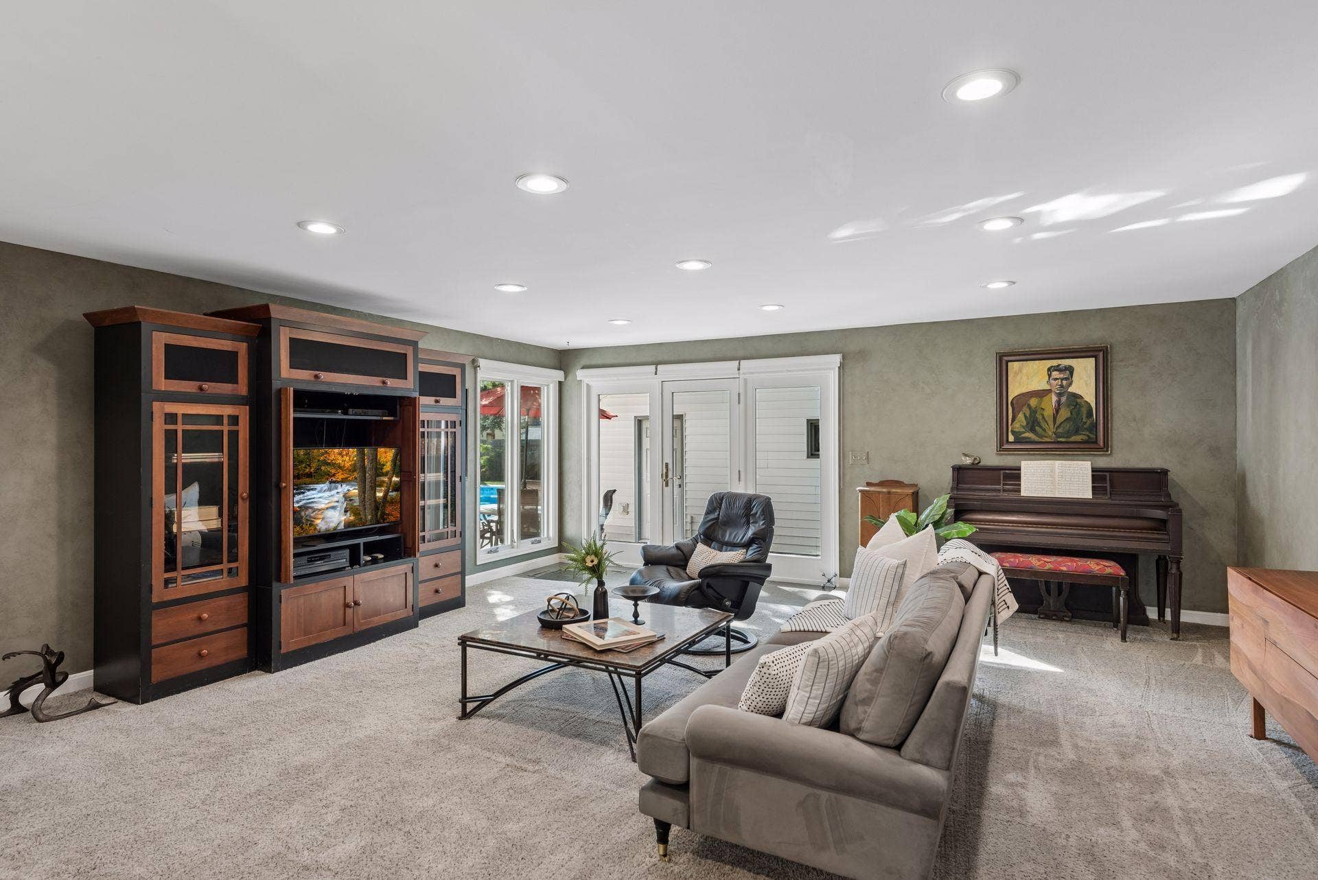 5212 Humboldt Avenue S, 49, Minneapolis, MN 55419 Family Room - Spacious main-level family room features abundant recessed lighting, large windows, comfortable gathering space, and direct access toward the detached garage, backyard, and pool.