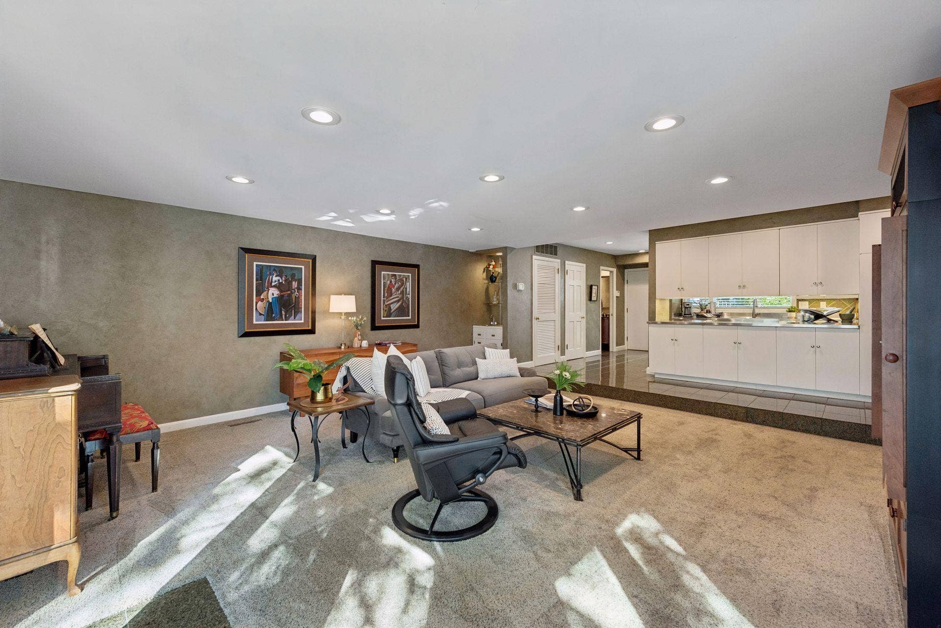 5212 Humboldt Avenue S, 49, Minneapolis, MN 55419 Family Room & Kitchen - Wide view illustrates the open connection between the expansive family room and kitchen, creating a spacious main-level gathering area with abundant recessed lighting.
