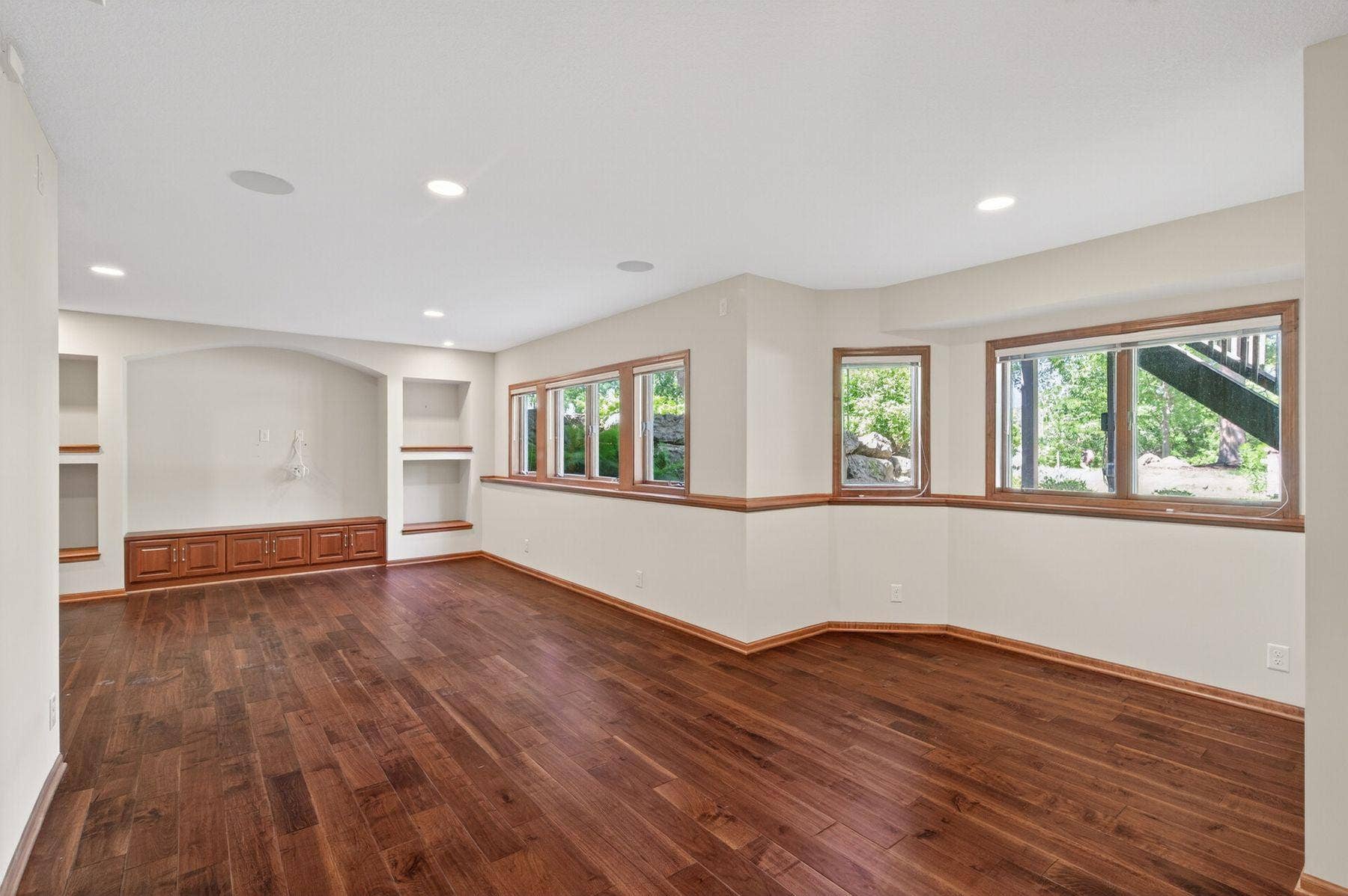 3034 Edgewater Drive, Woodbury, MN 55125 huge lower level with look out windows to the yard and lake
