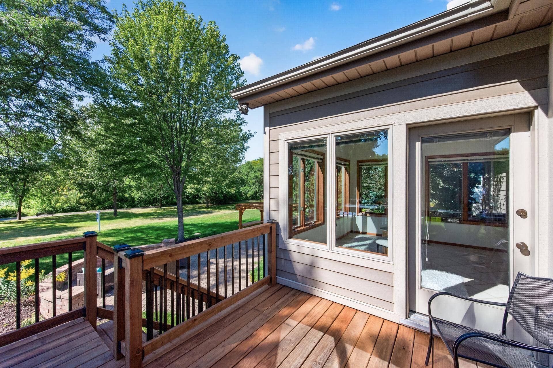 3034 Edgewater Drive, Woodbury, MN 55125 newly skinned deck with post lighting