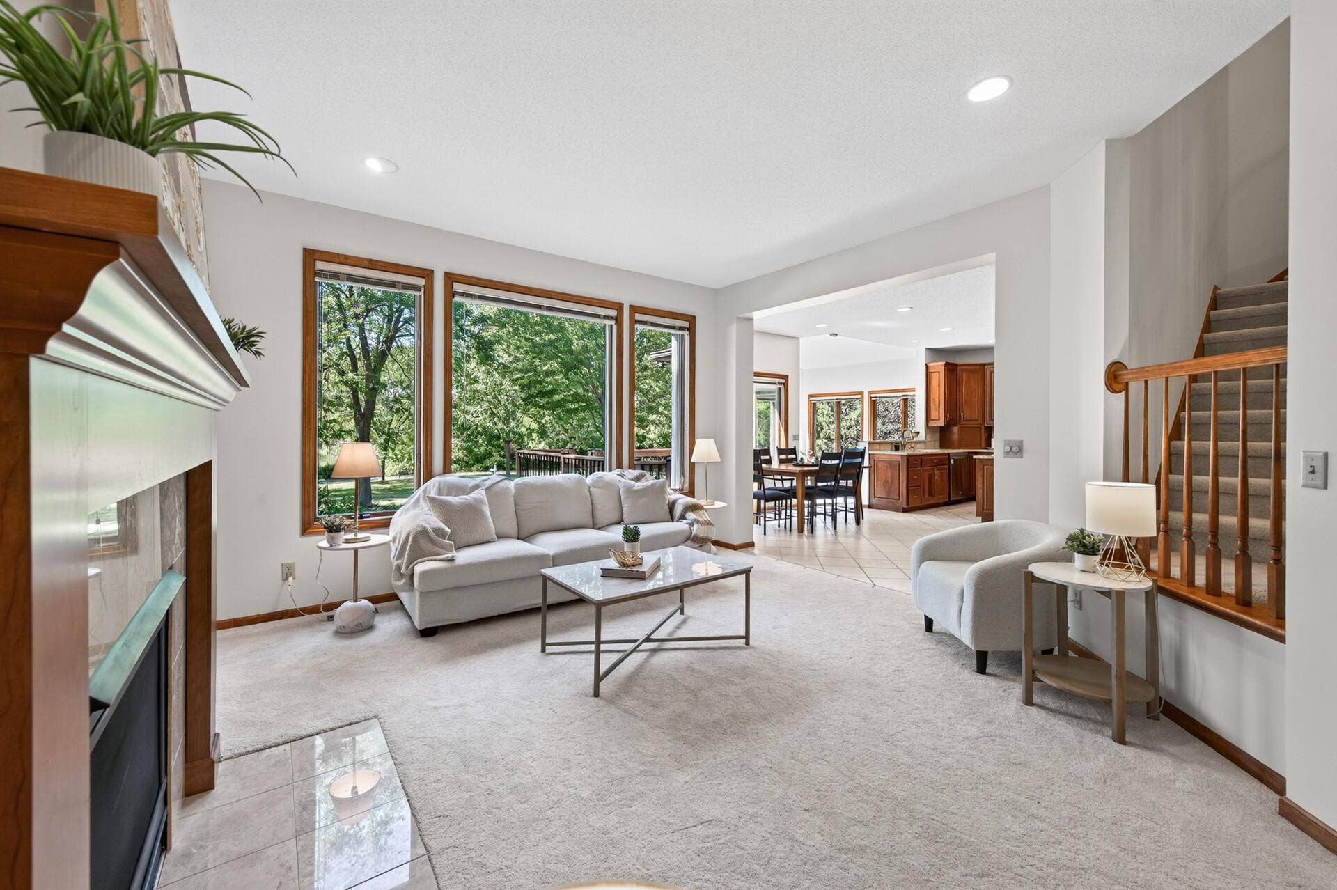 3034 Edgewater Drive, Woodbury, MN 55125 open to kitchen and sunroom