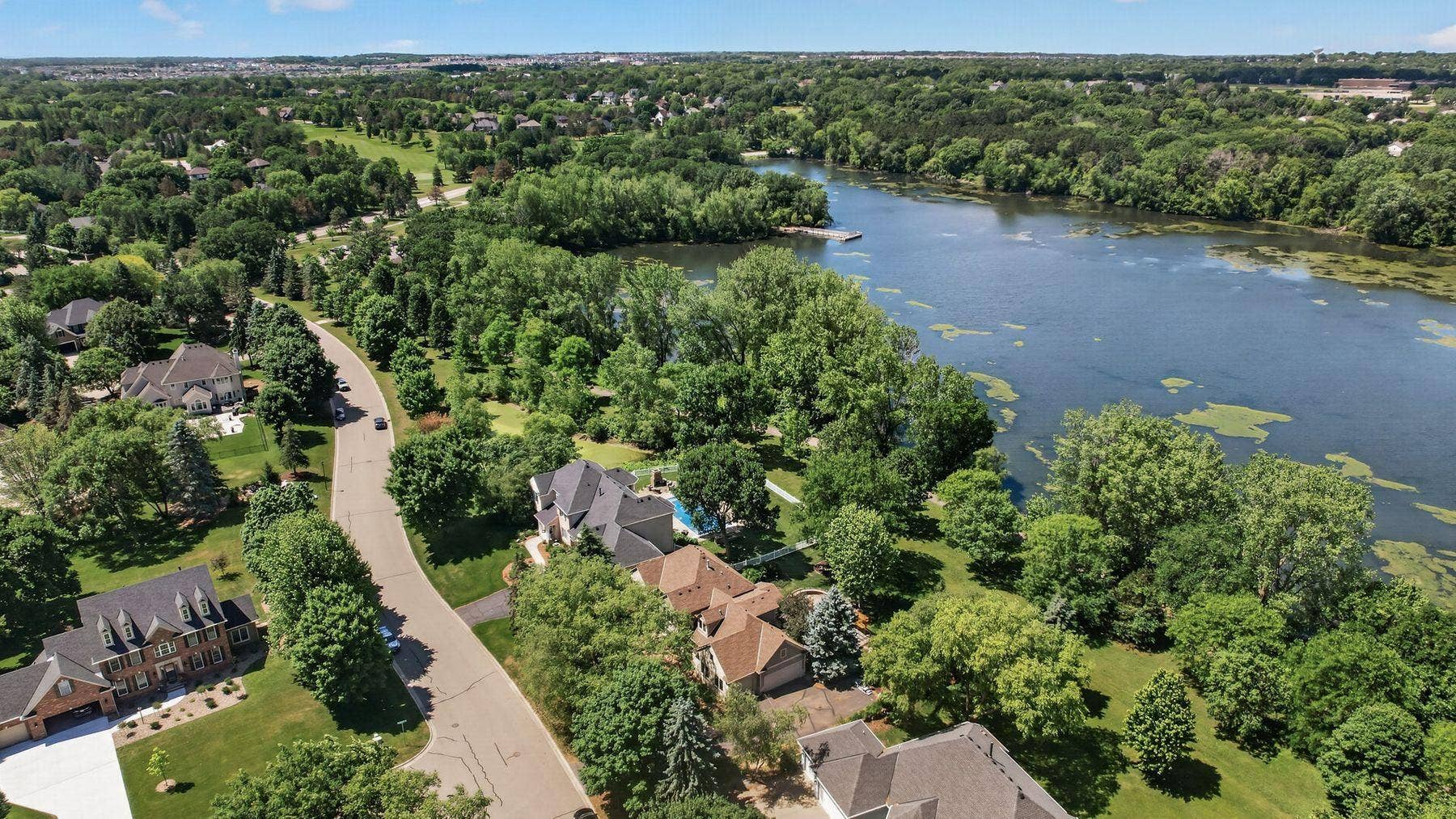 3034 Edgewater Drive, Woodbury, MN 55125 Serene lake side living