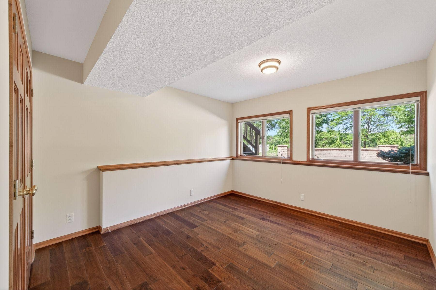 3034 Edgewater Drive, Woodbury, MN 55125 5th bedroom with windows facing the lake